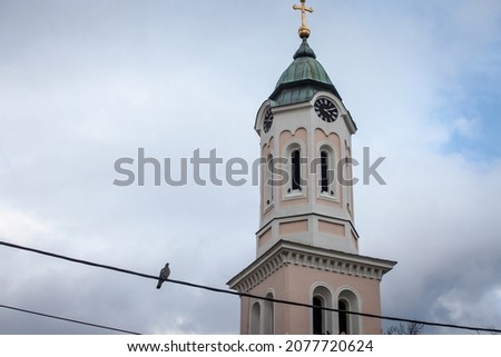 

Picture of the tower of the Serbian church, in Obrenovac Serbia indicating the time. Obrenovac is a town located in the South part of Belgrade, Serbia.
