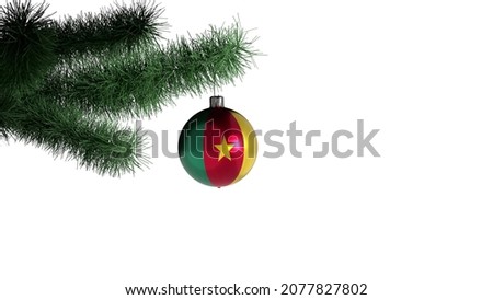 New Year's ball with the flag of Cameroon on a Christmas tree branch isolated on white background. Christmas and New Year concept.