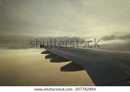 vintage picture Sky and clouds bird's eye view  sunset of the himalayas on the plane