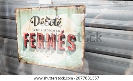desole nous sommes ferme french text means sorry we are closed sign board vintage board on windows shop restaurant cafe store signboard