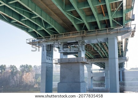 huge car bridge across the wide river