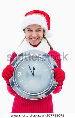 Beautiful festive woman holding clock on white background