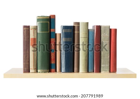 Books on the shelf, isolated. Royalty-Free Stock Photo #207791989
