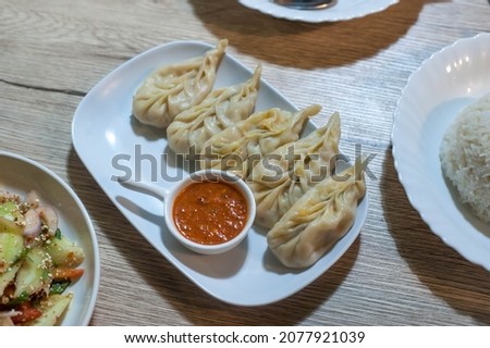 Top view of Steamed Veggie Momo (The Bhutanese appetizer) at Ong-Ang walking street in Bangkok Thailand Royalty-Free Stock Photo #2077921039