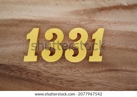 Golden Arabic numerals 1331 on a dark brown to white wood grain background.