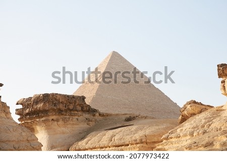 Pyramid of Khafre (lso read as Khafra, Khefren) or of Chephren is the second-tallest and second-largest of the Ancient Egyptian Pyramids of Giza and the tomb of the Fourth-Dynasty pharaoh Khafre  Royalty-Free Stock Photo #2077973422