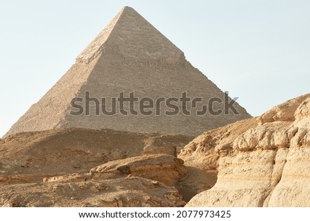 Pyramid of Khafre (lso read as Khafra, Khefren) or of Chephren is the second-tallest and second-largest of the Ancient Egyptian Pyramids of Giza and the tomb of the Fourth-Dynasty pharaoh Khafre  Royalty-Free Stock Photo #2077973425