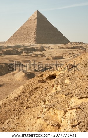 Pyramid of Khafre (lso read as Khafra, Khefren) or of Chephren is the second-tallest and second-largest of the Ancient Egyptian Pyramids of Giza and the tomb of the Fourth-Dynasty pharaoh Khafre  Royalty-Free Stock Photo #2077973431