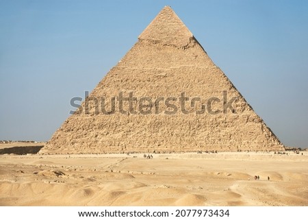 Pyramid of Khafre (lso read as Khafra, Khefren) or of Chephren is the second-tallest and second-largest of the Ancient Egyptian Pyramids of Giza and the tomb of the Fourth-Dynasty pharaoh Khafre  Royalty-Free Stock Photo #2077973434