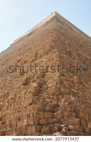 Pyramid of Khafre (lso read as Khafra, Khefren) or of Chephren is the second-tallest and second-largest of the Ancient Egyptian Pyramids of Giza and the tomb of the Fourth-Dynasty pharaoh Khafre  Royalty-Free Stock Photo #2077973437