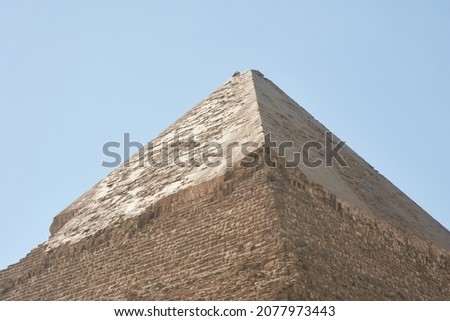 Pyramid of Khafre (lso read as Khafra, Khefren) or of Chephren is the second-tallest and second-largest of the Ancient Egyptian Pyramids of Giza and the tomb of the Fourth-Dynasty pharaoh Khafre  Royalty-Free Stock Photo #2077973443