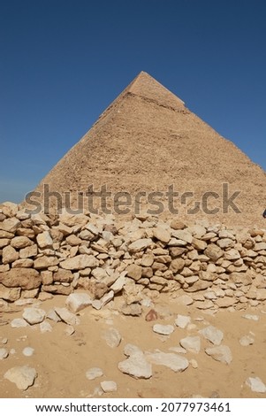 Pyramid of Khafre (lso read as Khafra, Khefren) or of Chephren is the second-tallest and second-largest of the Ancient Egyptian Pyramids of Giza and the tomb of the Fourth-Dynasty pharaoh Khafre  Royalty-Free Stock Photo #2077973461
