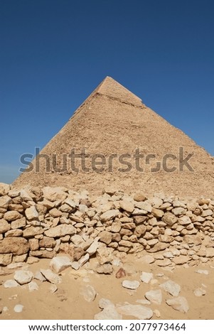 Pyramid of Khafre (lso read as Khafra, Khefren) or of Chephren is the second-tallest and second-largest of the Ancient Egyptian Pyramids of Giza and the tomb of the Fourth-Dynasty pharaoh Khafre  Royalty-Free Stock Photo #2077973464