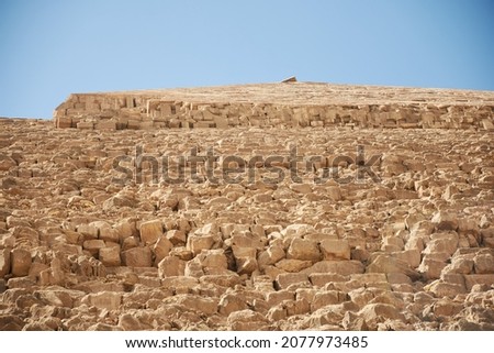 Pyramid of Khafre (lso read as Khafra, Khefren) or of Chephren is the second-tallest and second-largest of the Ancient Egyptian Pyramids of Giza and the tomb of the Fourth-Dynasty pharaoh Khafre  Royalty-Free Stock Photo #2077973485