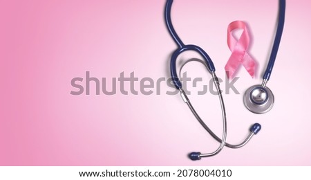 Pink ribbon and stethoscope on pastel background, Symbol of womens breast cancer