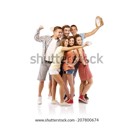 Group of happy young teenager students taking selfie photo isolated on white background