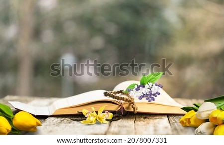 Book, flowers. Read, Rest. Cozy and hygge concept. Reading time