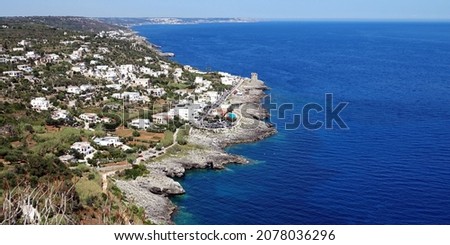 view of the rocky coast of the Adriatic sea near Santa Maria di Leuca, a hamlet of Castrignano del Capo, in the province of Lecce, in southern Salento, Puglia, Italy. Royalty-Free Stock Photo #2078036296