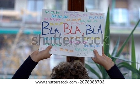 environmentalist child at home protest against global warming and climate change - There is not planet b, Bla Bla Bla and save world go green logo signThere is not planet B,  bla and save world Royalty-Free Stock Photo #2078088703