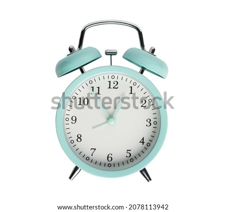 Beautiful blue retro alarm clock, popular alarm clock on white isolated background

