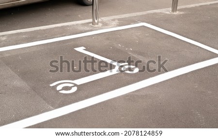 electric scooter parking place. marking on asphalt