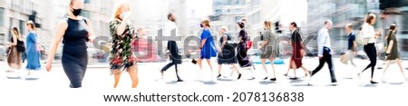 Lots of walking people, multiple exposure illustration represents modern life the big busy city. Business people, young people, students crossing the road
