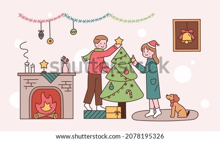 A couple is decorating a Christmas tree at home. Cozy with fireplace and dog. flat design style vector illustration.