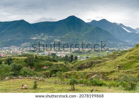 A stormy sky over the city of Kathmandu, Nepal with the Himalayan foothills in the background Royalty-Free Stock Photo #2078199868