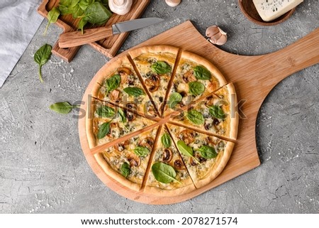 Tasty vegetarian pizza on grunge background Royalty-Free Stock Photo #2078271574