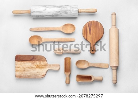 Set of kitchen utensils on light background Royalty-Free Stock Photo #2078275297