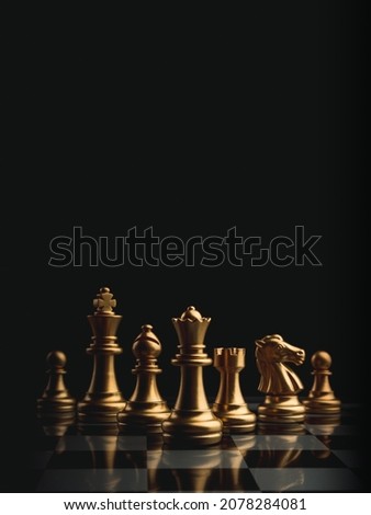 The set of golden chess pieces element, king, queen rook, bishop, knight, pawn standing on chessboard on dark background, vertical style. Leadership, teamwork, partnership, business strategy concept. Royalty-Free Stock Photo #2078284081