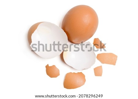 Isolated Broken eggshell. Top view group of broken eggshells stacked on white background. Flat lay. Royalty-Free Stock Photo #2078296249