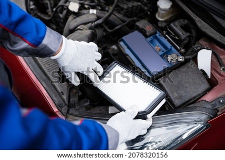 New Clean Car Filter. Vehicle Fresh Air. Automobile Maintenance Royalty-Free Stock Photo #2078320156