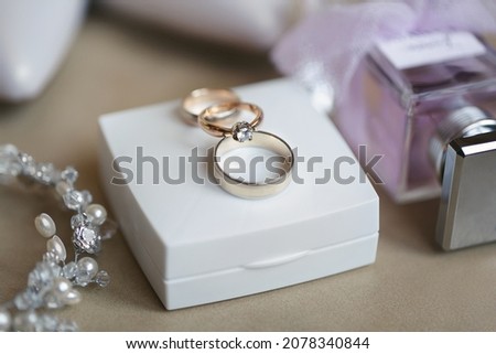 Wedding rings in a beautiful box before the ceremony. Details of the wedding day.
