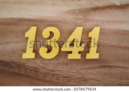 Golden Arabic numerals 1341 on a dark brown to white wood grain background.