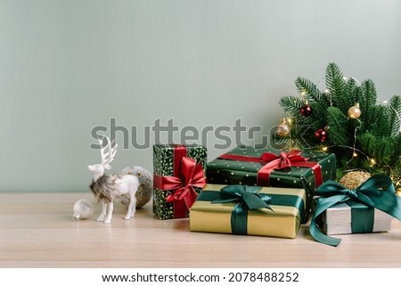 Christmas composition of Christmas decorations, balls, gift box,  christmas tree and copy space for text. Template.