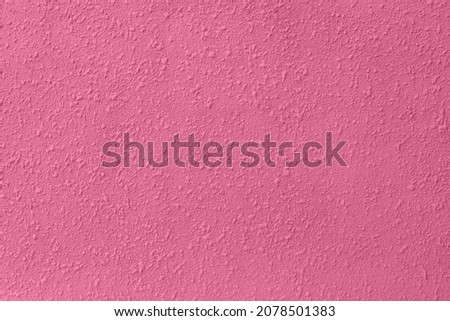 Abstract textured with high resolution. The texture of the finish of concrete walls with the color Pacific Pink.