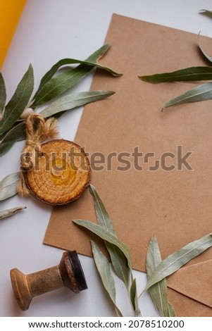wedding invitation with decor and leaves. 