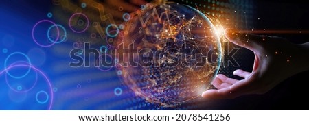 Businessman hand holding The metaverse universe,night grow earth and global online networking connection with data exchanges, global communication network security concept. Royalty-Free Stock Photo #2078541256