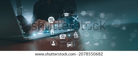 Businessman hand working with modern computer and smart phone show vitual innovation insurance online for car, travel, family and life, financial and health insurance. Insurance concept. Royalty-Free Stock Photo #2078550682