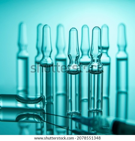 Laboratory. Development of a coronavirus vaccine. Ampoules with medicine. COVID 19. Macro photography, selective focus.