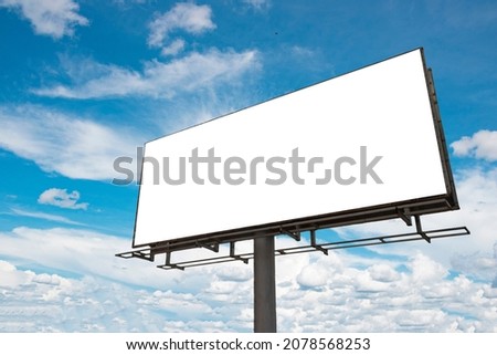Empty Blank  billboard mockup with white screen against cloudy sky background. Copy space banner for advertisement in a cloudscape.
