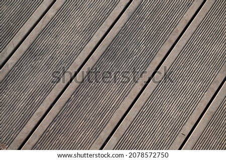 a fragment of the texture of a wooden patio floor