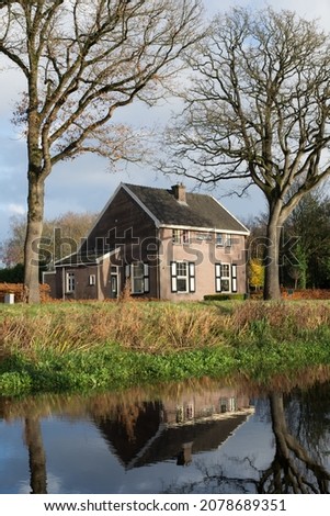 Buildings of the historic institute of beneficence in Veenhuizen in the province Drenthe in the Netherlands. House 'Opvoeding' in English: education or upbringing Royalty-Free Stock Photo #2078689351