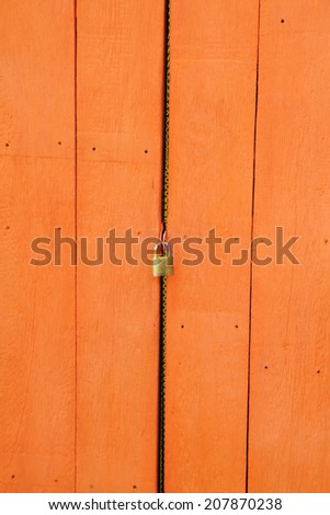 Wooden door with a key lock.