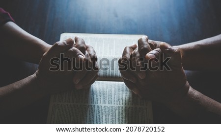 Couple are pray together, online group worship, world day of prayer, international day of prayer, hope, gratitude, thankful, trust concept Royalty-Free Stock Photo #2078720152