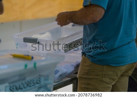 Ballot box with votes in the important presidential elections in Chile,just opened to start the final count of the votes cast in this country. Very important for the future of the country!Great doubt Royalty-Free Stock Photo #2078736982