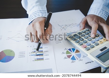Business woman looking at charts, spreadsheets, graph financial development, bank accounts, statistics, economy, data analysis, investment analysis, stock exchange Royalty-Free Stock Photo #2078744494