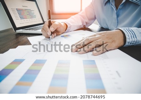 Business woman looking at charts, spreadsheets, graph financial development, bank accounts, statistics, economy, data analysis, investment analysis, stock exchange Royalty-Free Stock Photo #2078744695