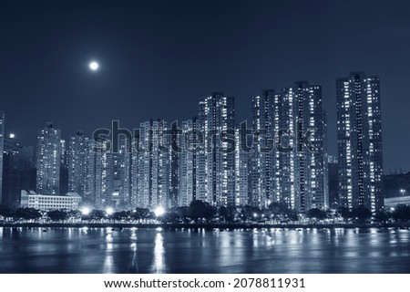 Full moon over residential district of Hong Kong City 